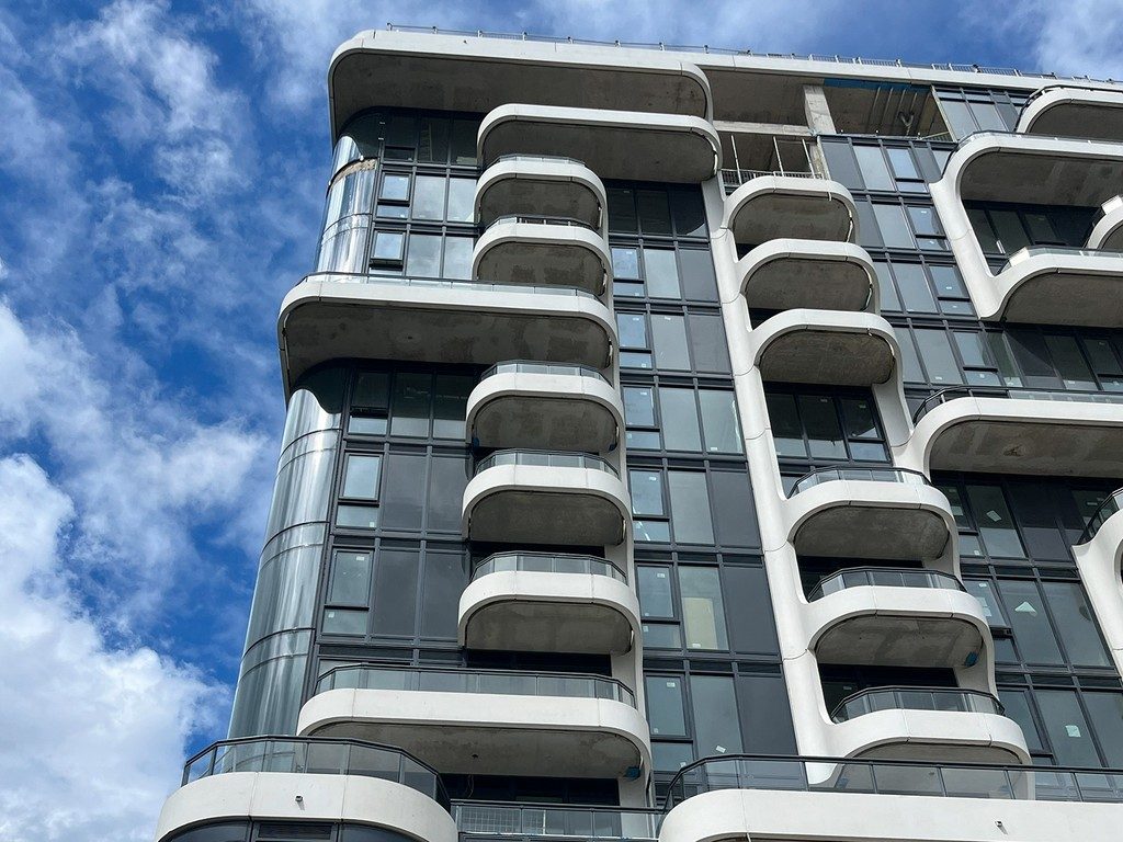 Multi-Residential Modern balcony architecture on a glass residential tower, project consulting and Colour-Selection by colorlab.